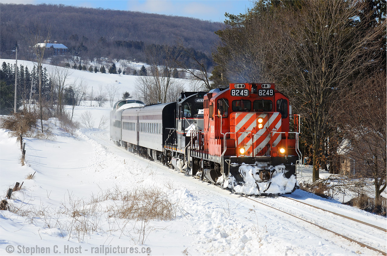 This is the last CP GP9 on the CP roster as of 08/2015 - Apparently assigned to Moose Jaw - can anyone from Saskatchewan see if it's active, working , or parked somewhere? 
8249 is leading the Credit Valley Explorer Snow Train, passing by the scenic Niagara Escarpment - pinch hitting for CCGX 4009 (trailing) as it had mechanical issues. The dome also adds a touch of class to this train, don't you think?
8249 was not a good performer on this day and it was quickly returned to CP for GP20C-ECO 2267. I figured that 8249 was done for and would be sent to its death or for conversion to an ECO but in fact it appears to be the very last survivor of this series on the roster today. 8249 is apparently US owned. If you have any further details to the disposition of 8249 please add a comment below, anytime. Thank you.