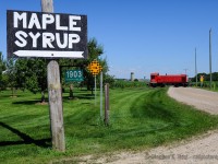 <b>Mennonite Country</b> - GEXR 584, with a Montreal Locomotive Works S3 number 6593  heads light to Elmira to switch cars. Due to Region of Waterloo culvert work for ION LRT construction, the line was closed through Waterloo necessitating some creative borrowing of a the Waterloo Central railway's largest diesel.