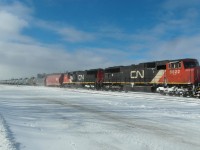 A pair of EMD units lead a tank train.
