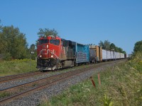 CN 369 heads to Oshawa to assist disabled CN 306 on the afternoon of 8/22. Seen here at Riley Road, east of Clarke East.