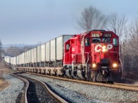 CP SD40-2s 5676 and 5990 hustle train 122-17 eastward down the main at Oshawa on CP's Belleville Sub.