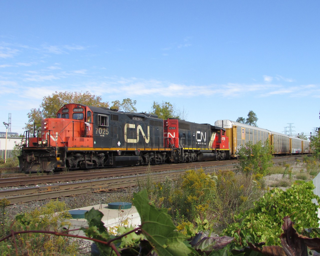 When CN 422 was in the yard currently... CN 547 with a classic leader pulls its short load of autos down the CN Oakville SUB.