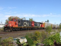 When CN 422 was in the yard currently... CN 547 with a classic leader pulls its short load of autos down the CN Oakville SUB.