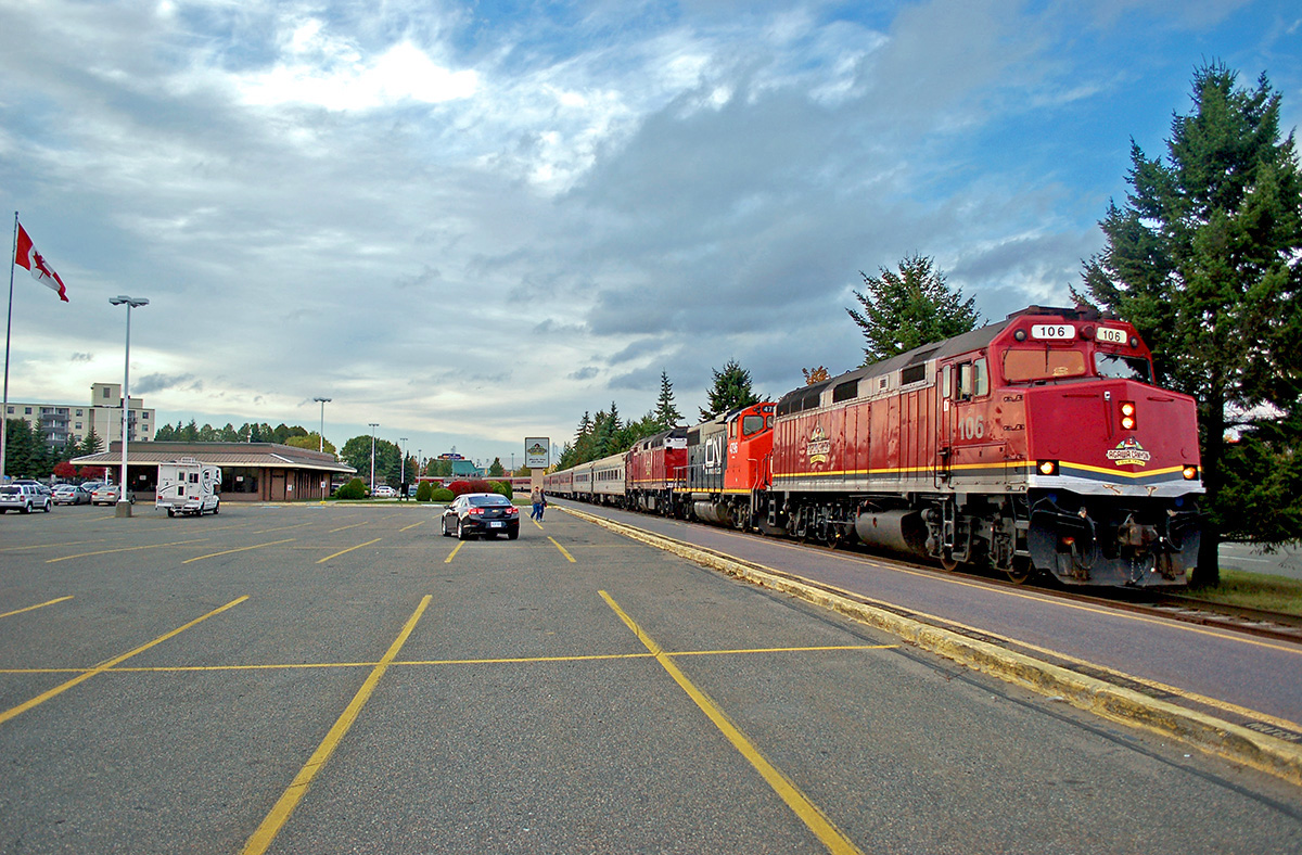 CN 106, 4796 & 105 with an 18-car Agawa Canyon Tour train consist after arrival at the station in Sault Ste. Marie, ON. My wife & I journeyed to the Soo to ride this, the last run of 2015. The consist of the train, given below, included several ex-DRGW Ski Train, nee CN, Tempo cars, and ex-DRGW Ski Train, nee Amtrak, F40PH's plus a CN GP38-2W. For more pics from this trip see my web page at:  http://northamericabyrail.info/canada-east/the-agawa-canyon-tour-train-revisted-sault-ste-marie-on-agawa-canyon-on/  . Videos to be added soon!

CN F40PH #106, EX SKTX 289, AMTK 289 

CN GP38-2W #4796 

CN F40PH #105, EX SKTX 283, AMTK 283 

AC 5656 COACH, EX AMTK 7624 

AC 5654 COACH, EX AMTK 7621 

AC 5713 'RAND LAKE' COACH, EX DRGW 800427, VIA 323 

AC 5711 'TROUT LAKE' CAFE-LOUNGE, EX DRGW 80042,5 VIA 321 

AC 5712 'GOULAIS RIVER' COACH, EX DRGW 800426, VIA 322 

AC 5710 'AGAWA RIVER' COACH, EX DRGW 800440, VIA 375 

AC 5709 'MONGOOSE LAKE' COACH, EX DRGW 800433, VIA 364 

AC 5701 'MONTREAL RIVER' COACH, EX DRGW 800431, VIA 350 

AC 5707 'HUBERT LAKE' COACH, EX DRGW 800421, VIA 342 

AC 506 DINER, EX CB&Q 'SILVER PHEASANT' 

AC 5703 'CHIPPEWA RIVER' CAFE-LOUNGE, EX DRGW 800420, VIA 341 

AC 5655 COACH, EX AMTK 7622 

AC 5702 'LAKE SUPERIOR' COACH, EX DRGW 800441, VIA 362 

AC 5708 'OGIDAKI LAKE' COACH, EX DRGW 800444, VIA 371 

AC 5706 'BATCHEWANA RIVER' COACH, EX DRGW 800443, VIA 373 

AC 5705 'SPRUCE LAKE' COACH, EX DRGW 800432, VIA 351 

AC 5704 'ISLAND LAKE' COACH, EX DRGW 800442, VIA 366 

AC 5700 'ACHIGAN LAKE' COACH, EX DRGW 800430, VIA 376