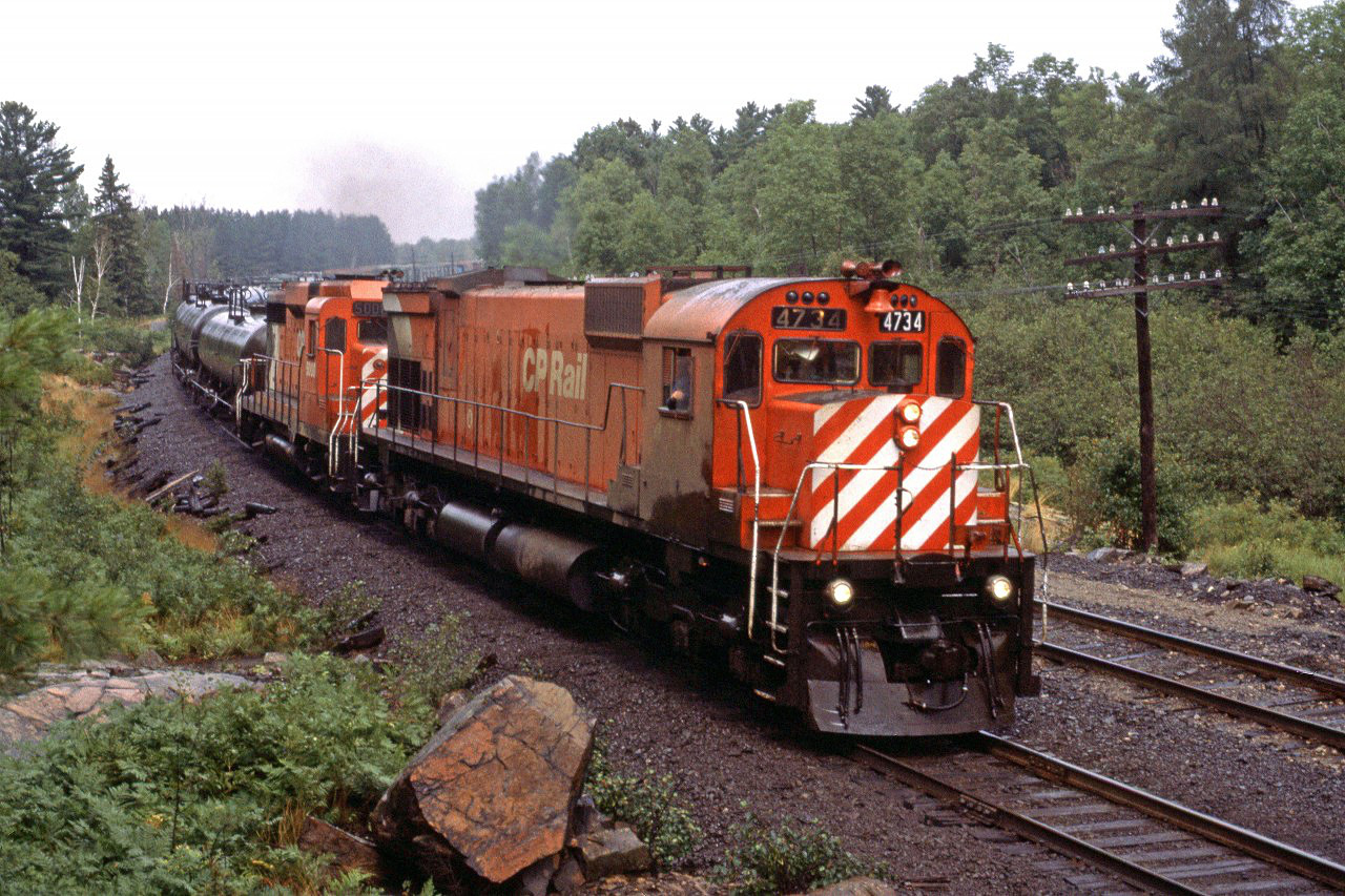 Southbound manifest train near Grundy Provincial Park. Note the GP-30 trailing