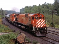 Southbound manifest train near Grundy Provincial Park. Note the GP-30 trailing