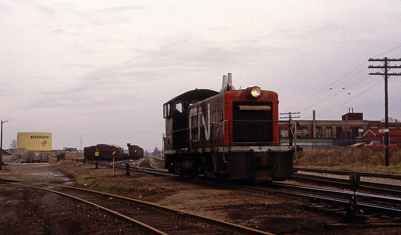 On a rather dreary day in early December, CN 7170 switches the west end of the small yard in Kitchener.
