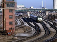 706, on the rear, provides most of the power for this short train as it approaches TUS.