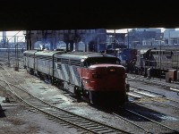 This was my only successful stop at Spadina Street. I much-preferred Bathurst St
At the time, I did not know just how railfan-friendly the shops were. I elected to stay on the convenient stairway that led down to the tracks.
The FPA-4's were my favorite subjects while in Toronto. The 1600 hrs clear, low angle light highlights the louvers and other details on the side and top of the locomotives.