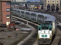 Yes, another eastbound GO train. It is 1652 hrs on April 18 1980. No wide cab units or F-40's yet - at least not in this picture.
Spadina Shops and another Go Train are seen at the top of the photo.