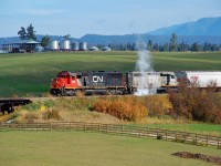 The morning mixed freight is climbing the grade out of Armstrong when it comes to an unscheduled stop.
GTW 5946 releases a large puff of smoke and requires attention from the crew. After about 20mins they are on their way, any guesses on the problem? 
