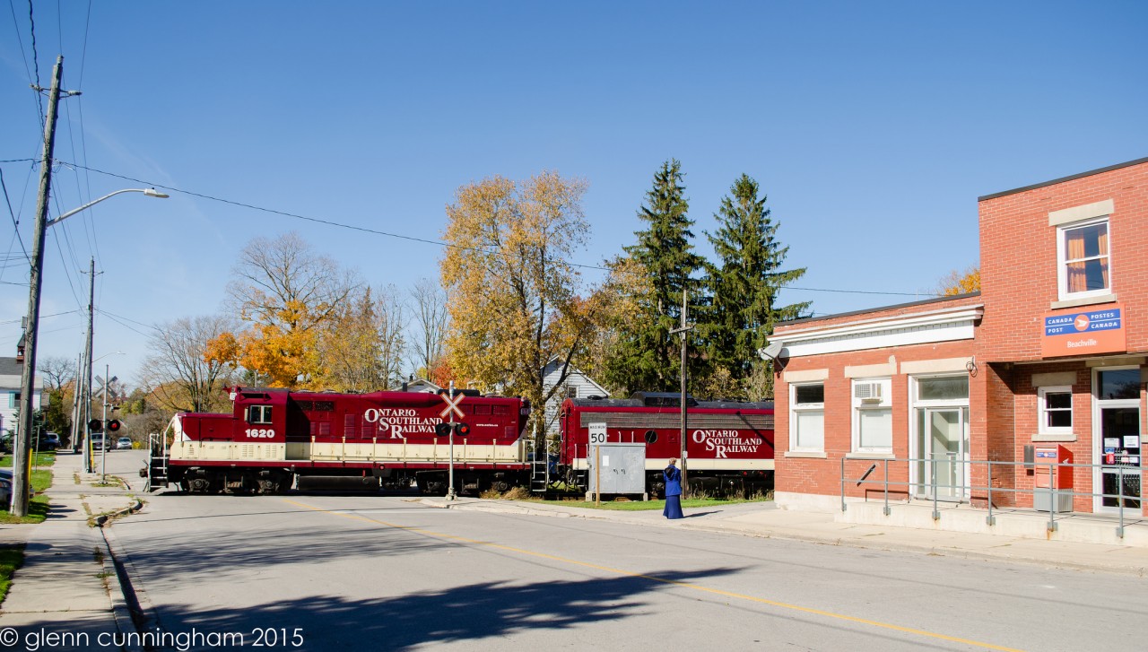 Ontario Southland  GP9 1620 and FP9u 6508  switch the siding in Beachville as they prepare their train for Ingersoll and Putnam. It appeared to me that the regulars at the post office and Andy's Garage have become quite used to this daily occurrence.