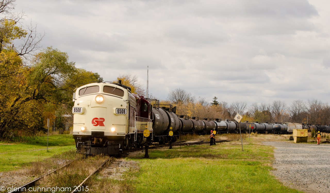 OSR 6508 and 1620 are seen leaving the small CN yard in St. Thomas ON on their return trip to Ingersoll after setting off their train and picking up the return traffic.