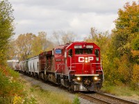 After setting off 34 cars at Kinnear Yard in Hamilton train 254 approaches the Quigley Road crossing on it's way south up the Niagara Escarpment. It was a pleasant surprise to see the 3065 leading as todays Hamilton sub trains usually get 2 or 3 GE's. 