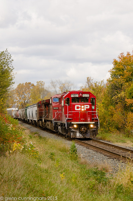 After setting off 34 cars at Kinnear Yard in Hamilton train 254 approaches the Quigley Road crossing on it's way south up the Niagara Escarpment. It was a pleasant surprise to see the 3065 leading as todays Hamilton sub trains usually get 2 or 3 GE's.