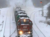 Saturday March 8 2008...the beginning of March break...except the masses were having trouble exiting at the airport due to a snowstorm covering the region.....Although CP 255 has no trouble making its way out onto the CN with SOO 6053 and two leasers trailing. No one else was on the walkway this day : ) 