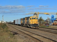 2200 and 1802 lead 34 cars eastbound out of Hearst towards Kapuskasing.  The 60 mile journey will take just under three hours and makes for a very relaxing chase.