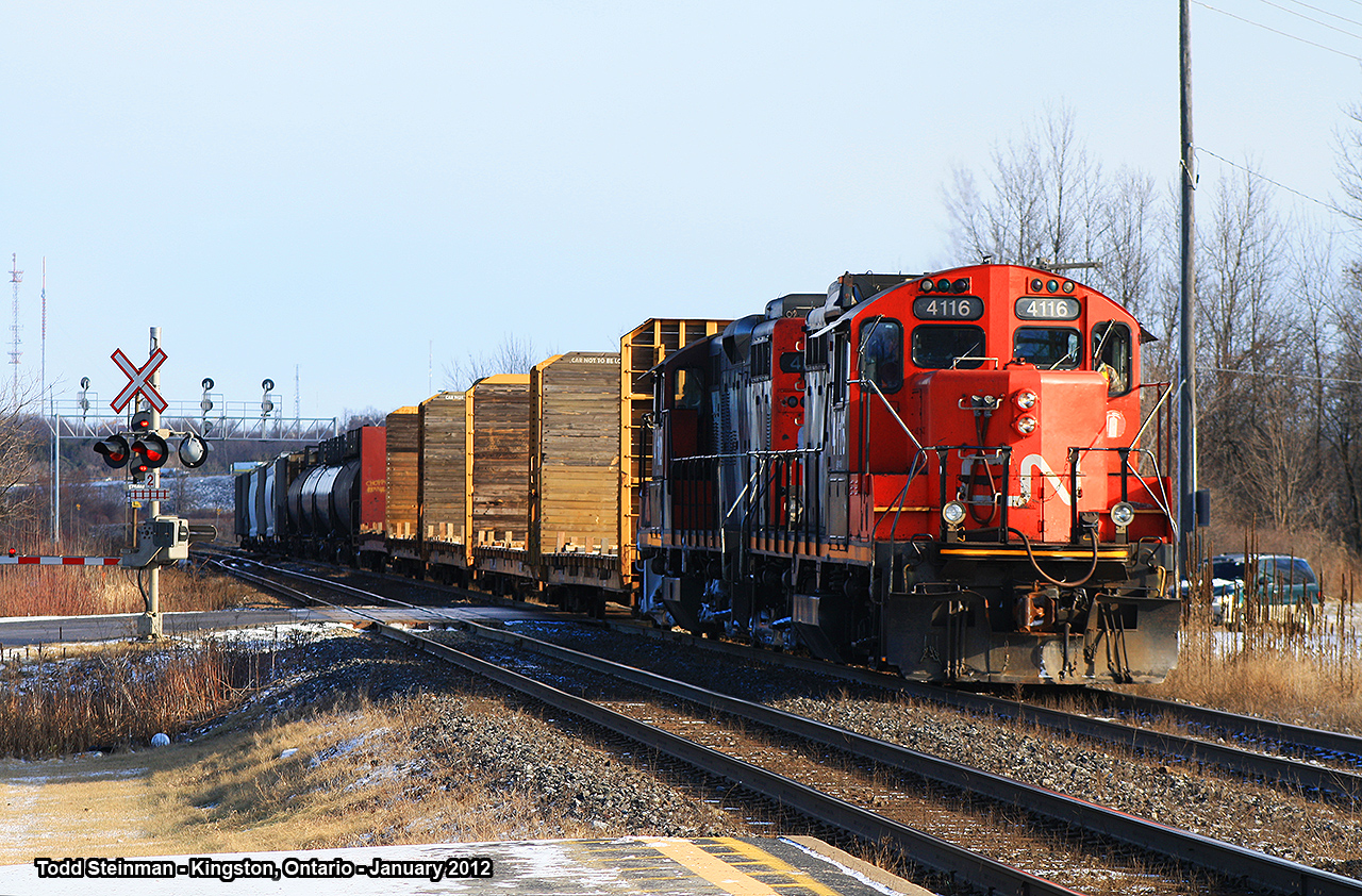 CN 4116 and 4112 cross John Counter Boulevard and approach the VIA station at Kingston. I was lucky enough to photograph 4116 twice in 2012. Once here at Kingston, and again in September closer to home at Brantford...view it here:  http://www.railpictures.ca/wp-content/uploads/2015/10/4116-Brantford.jpg
