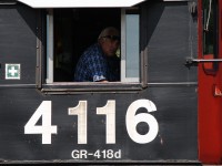 <b> PEEKABOO! </b> The crew aboard CN 4116 was just finishing their assignment in the Brantford yard, although the engineer seemed unimpressed as I took his photo.