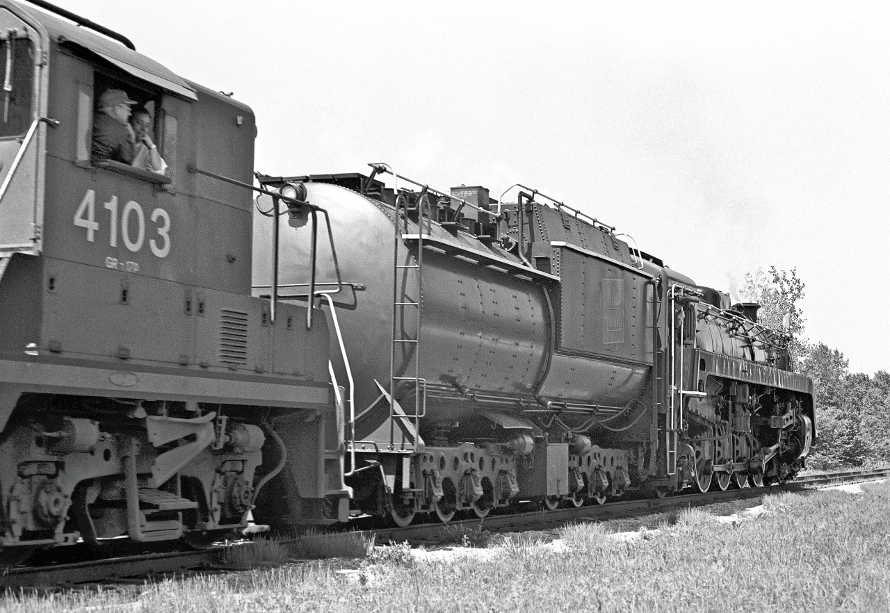 EMD GP9RM #4103 (built in March '59) is paired with the majestic Mountain-type.