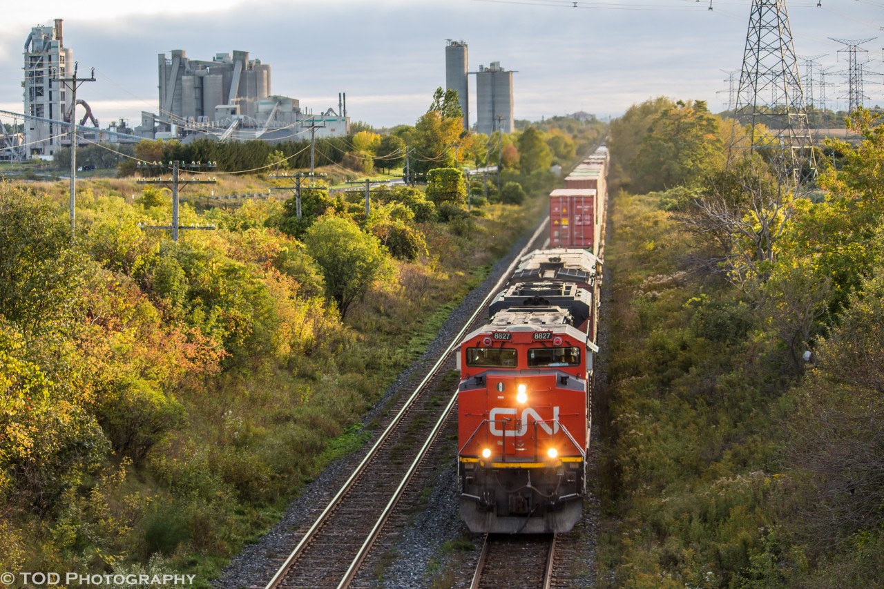 On a beautiful Fall evening, the daily Chicago-Montreal intermodal train makes its way through Bowmanville next to the St-Mary's Cement Plant.
