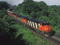 Bombardier-built HR-616 2119 (the last CN locomotive from the MLW plant) leads Toronto - Fort Erie train #433 train on the approach to Bayview. 