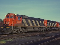 A brisk wind is blowing from the east as CN M-636 and C-630 2004 sit at the Fairview engine terminal in Halifax, NS.