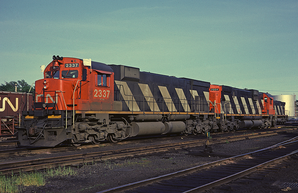 A brisk wind is blowing from the east as CN M-636 and C-630 2004 sit at the Fairview engine terminal in Halifax, NS.