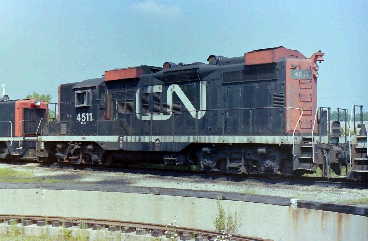 One of two or three CN snow plow pushers that I managed to catch while visiting my mother in London Ont. As a child growing up in London I always visited the rail yards. Sad to see how the railways in London have changed. As an example: London had 4 roundhouses in the 1950,s and is now down to almost one. In this picture CN 4511 is sitting on the north edge of the CN turntable pit.