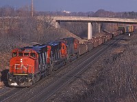 Two out of three ain't bad! CN GP40-2W 9564 leads Toronto - Sarnia train #425 up the grade from Bayview, passing under the RBG footbridge near Mile 1 on the Dundas Sub. Train #425 was a regular mid-afternoon train on the Dundas Sub.  