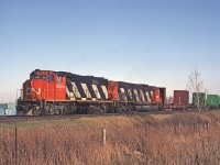 CN GP40-2W 9569 leads trains #380 eastbound on the Halton Sub. 