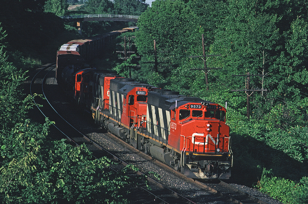 Luckily CN 9573 West is on the south track and escapes the lengthening shadows as it approaches Bayview.