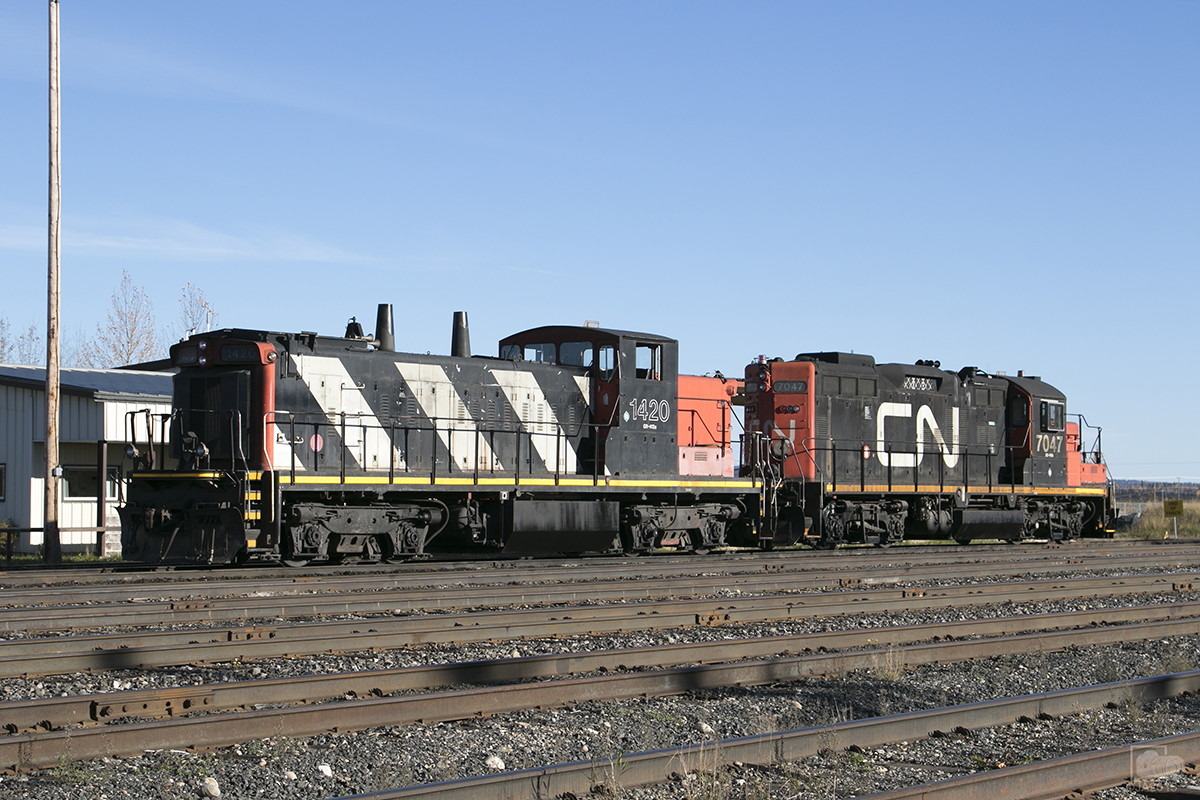 CN 1420 & CN 7047 sit basking in the sun light, awaiting it's next assignment and call to duty.