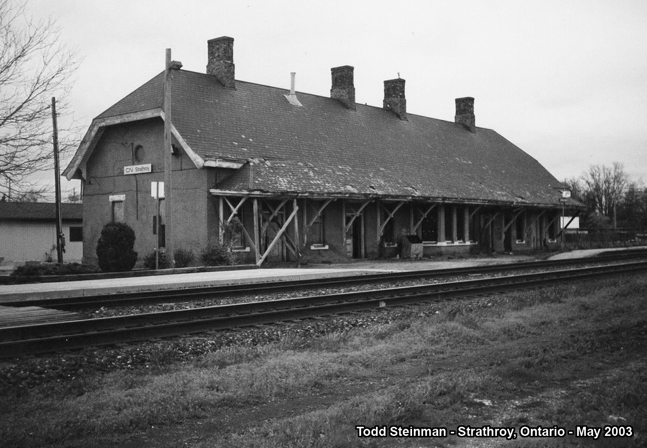 The impressive brick station at Strathroy. Still painted in CN colors from mid-70's to early 80's, and unused by the railway since then. Sadly, this station (originally built by the Great Western Railway) was vandalized and as a result, burnt to the ground in 2004.