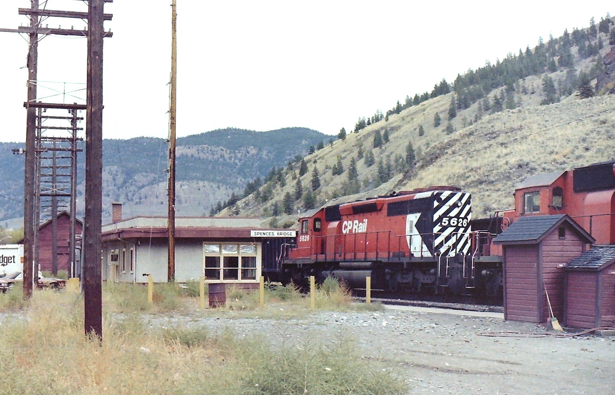Spotted the CP station while driving north on the Trans Canada Highway, so I dropped in to have a look. The station was of a newer design, so I took this photograph. Lots of action at the time. Now all buildings are gone. My only regret is that I never took the time to measure the outhouse!  TO this day I have never seen a CP western lines standard plan for an outhouse.