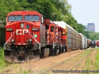 CP 8547 sits on the mainline with two other units waiting for a crew change at the Century Bricks entrance off of Lawrence Road. In the distance, we can see the tail end of another CP freight rumbling through the ex THB Kinnear Yard. It is heading west for what I presume was it's final destination of the Aberdeen Street yard. 