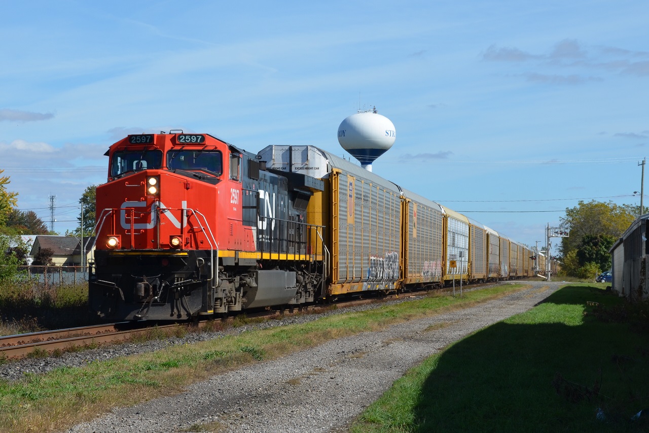 A solo dash 9 leads autoracks bound for Flat Rock, MI.