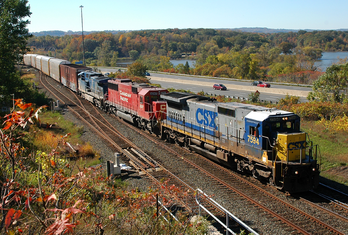 142 finally gettng underway from Desjardins with CSXT 7594, CP 6247, CEFX 1024 and 125 cars