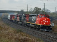 <b>Back To The Future Day</b>  October 21, 2015 The day that Marty McFly and Doc Brown rode their modified AMC Delorean into the future to change the course of history.  I wonder if they foresaw CN 384 with a SD40-2W leading??  Pictured this morning is CN 384 rolling through the curve at Garden Ave with CN 5347 wearing a fresh coat of paint and looking pretty sweet!  Not bad for the future!