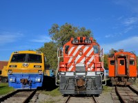 <b>Lined up at Exporail.</b> LRC-3 VIA 6921, GP9 CP 1608 and MU car CN 6734 are lined up around the turntable at Exporail.