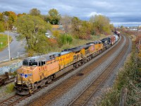<b>Two UP AC4400CW's in Montreal.</b> About 24 hours after arriving in Rouses Point, NY as CP 931, CN 529 has arrived in Montreal with two UP AC4400CW's leading an NS Dash9 (UP 5769, UP 5615 & NS 9166) as it passes through Montreal West on its way to nearby Taschereau Yard.