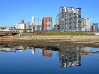 <b>Missing some water for a full reflection.</b> AMTK 17 pushes the Adirondack consist to Central Station, with great dome car 'Ocean View' at the head end. In the foreground is the mostly empty Peel Basin, as the Lachine Canal and the Peel Basin are partially drained every fall.