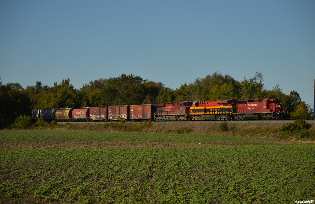 After quite a bit of delay at Spence waiting for 421 and Honda 3 to make some moves that had the South end blocked onto the mainline, CP 5866 South is back on the move cleared all the way down to Begin/End CTC Sign Bolton. This year's fall colours have been terrible, so far, luckily KCS 4857 provides a nice splash of red and yellow I was hoping for!