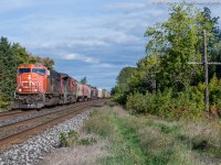 CN 435 roars through Lynden as the gorgeous afternoon sun lights up the train on the last day of September.