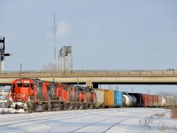 <b>GTW leader.</b> CN 527 is working Southwark Yard in St-Lambert with 5 units, including a GTW leader (GTW 5932, CN 2136, CN 4784, CN 4720 & CN 4803). The last three units were taken off of CN 393 which unusually terminated at Southwark Yard. Next stop is work at Pointe St-Charles yard and then to Taschereau Yard. GTW 5932 was built for Missouri Pacific in 1975 as MP 3177. Later it became UP 4177, before CN bought it in 1990.
