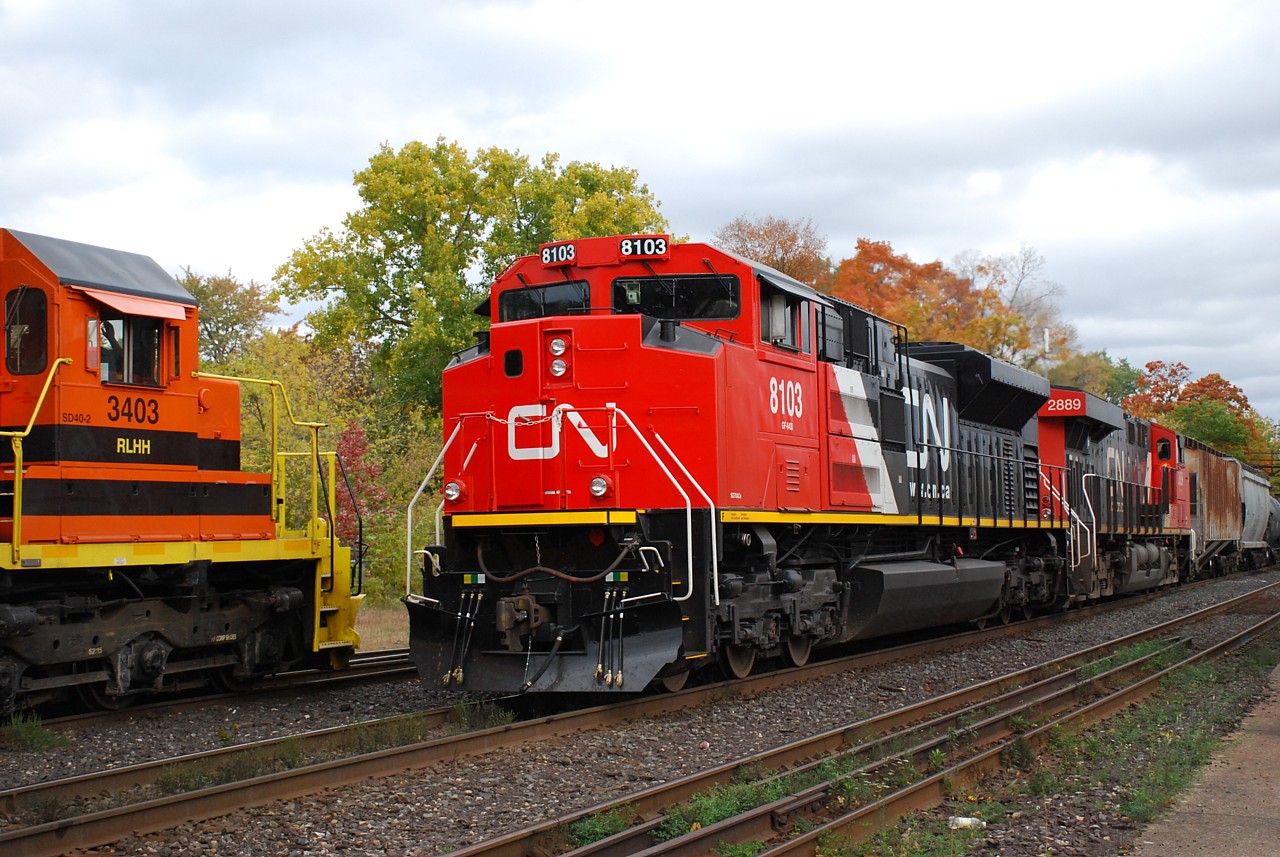 CN 435 with recently repainted CN 8103 leading, passes RLHH 3403 working Brantford Yard.  The RLHH was backing up at the time, so the timing worked out pretty good.  Thanks for the heads up James, it was a good thing we crossed paths this afternoon.