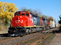 Bright sun, fall colours, and a freshly painted SD40-2W... what more could you ask for?  Original number boards, classification lights, and it still has a bell to boot!  Not too shabby. CN 5347 is notable as being one of few CN locomotives to grace the rails of the former Bessemer & Lake Erie. 