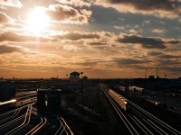 It's friggin cold up on this bridge, but the shot was well worth the wait. An eastbound go train under the strong backlit winter sun rolls through approaching their next station stop at Mimico. 