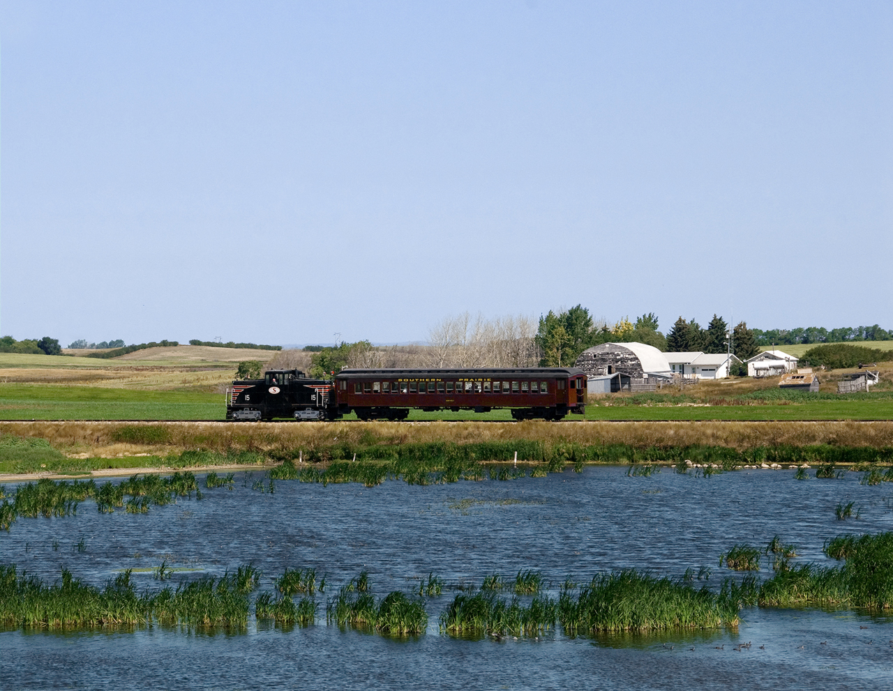 Southern Prairie Railway operates a tourist line out of Ogema Sask, south of Regina, on GWR's former CP Assiniboia Subdivision with an ex MEC 44T and a DLW coach. First of 2 Sunday runs nears the half way point on the run from Ogema to Horizon