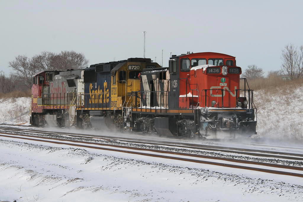 CN 391 with BNSF B40 and a GP60 plus a dead CN GMD1 1436 cuts off his train - preparing to make a lift at Aldershot